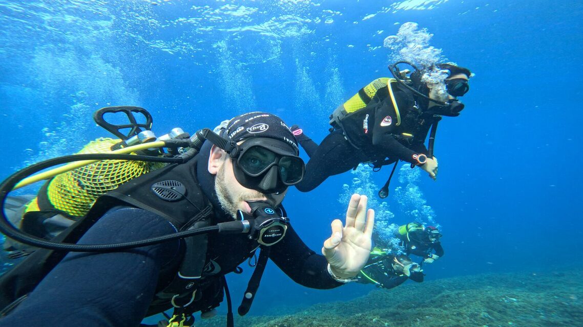 A scuba diver in open water off Madeira
